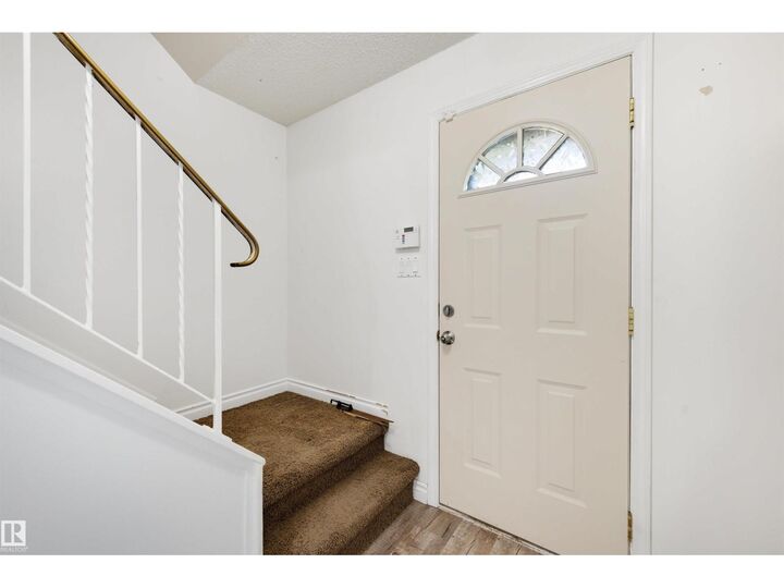Property Photo: 303 Primrose Gardens Gd NW AB T5T 0R1