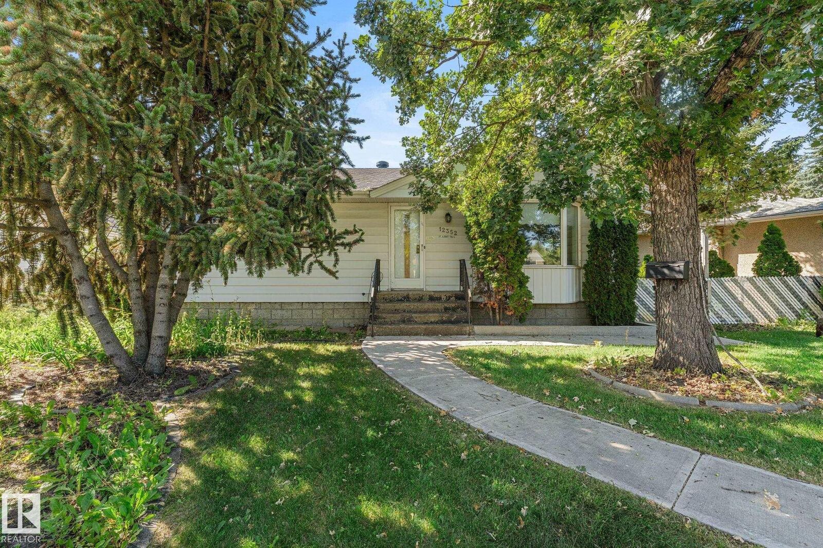 Property Photo: 12352 St Albert Trail NW AB T5L 4G8