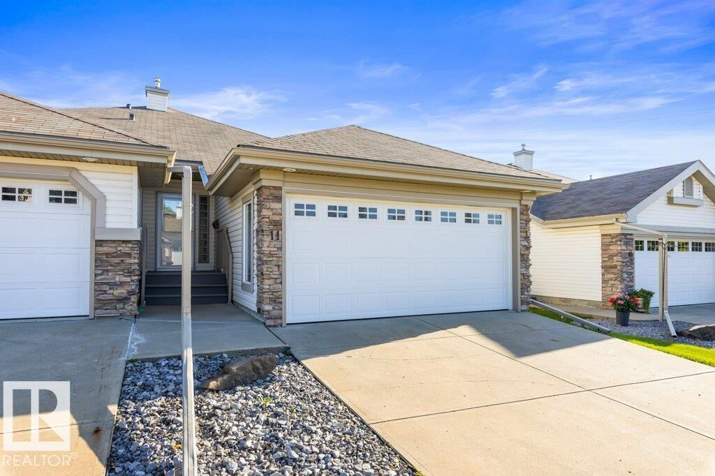 Property Photo:  4 Heritage Way 11  AB T8N 6W3 