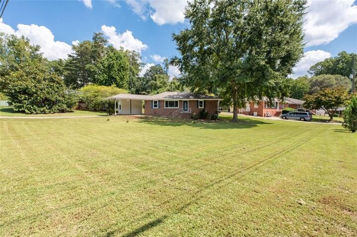 Property Photo: 208 SE Yancy Drive SE GA 30067