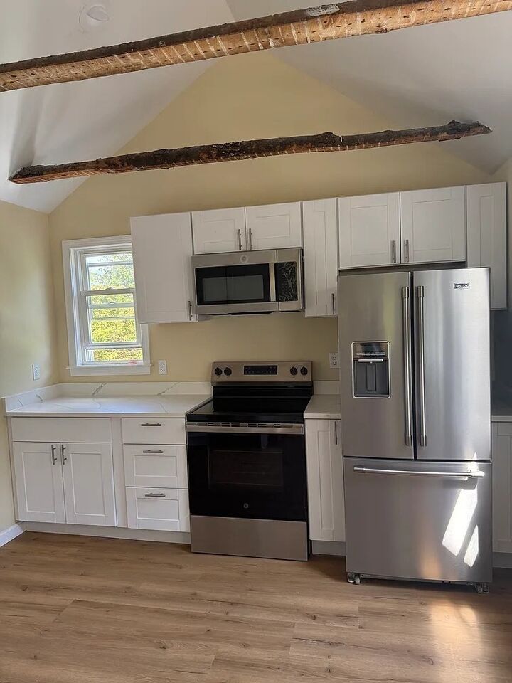 Property Photo:  1 Pond Place 1  MA 02038 
