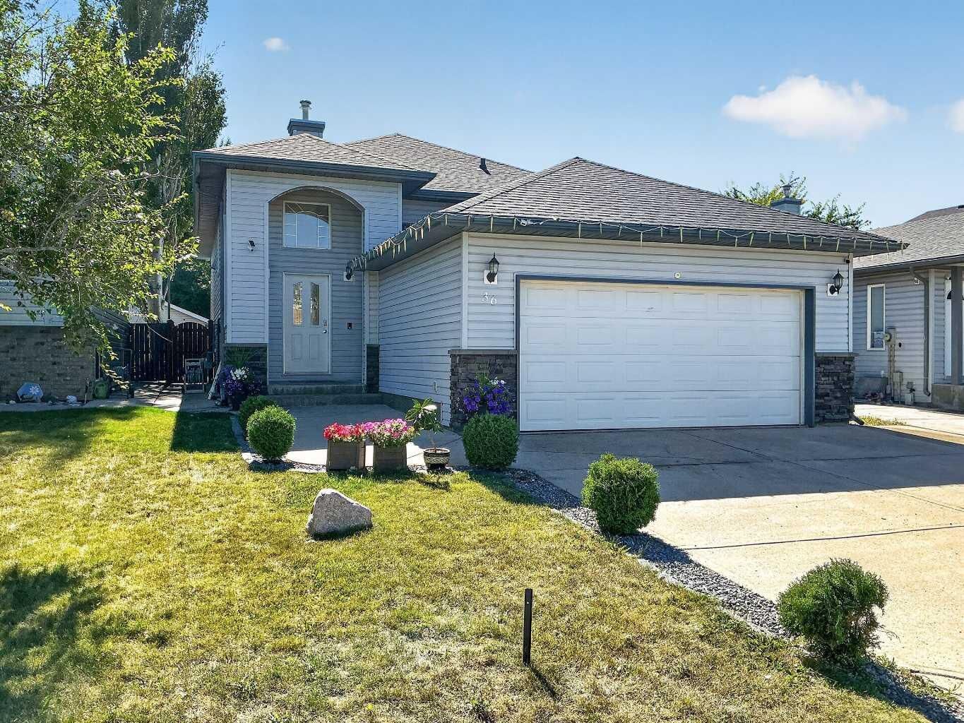 Property Photo:  36 Kodiak Boulevard N  AB T1H 6S7 