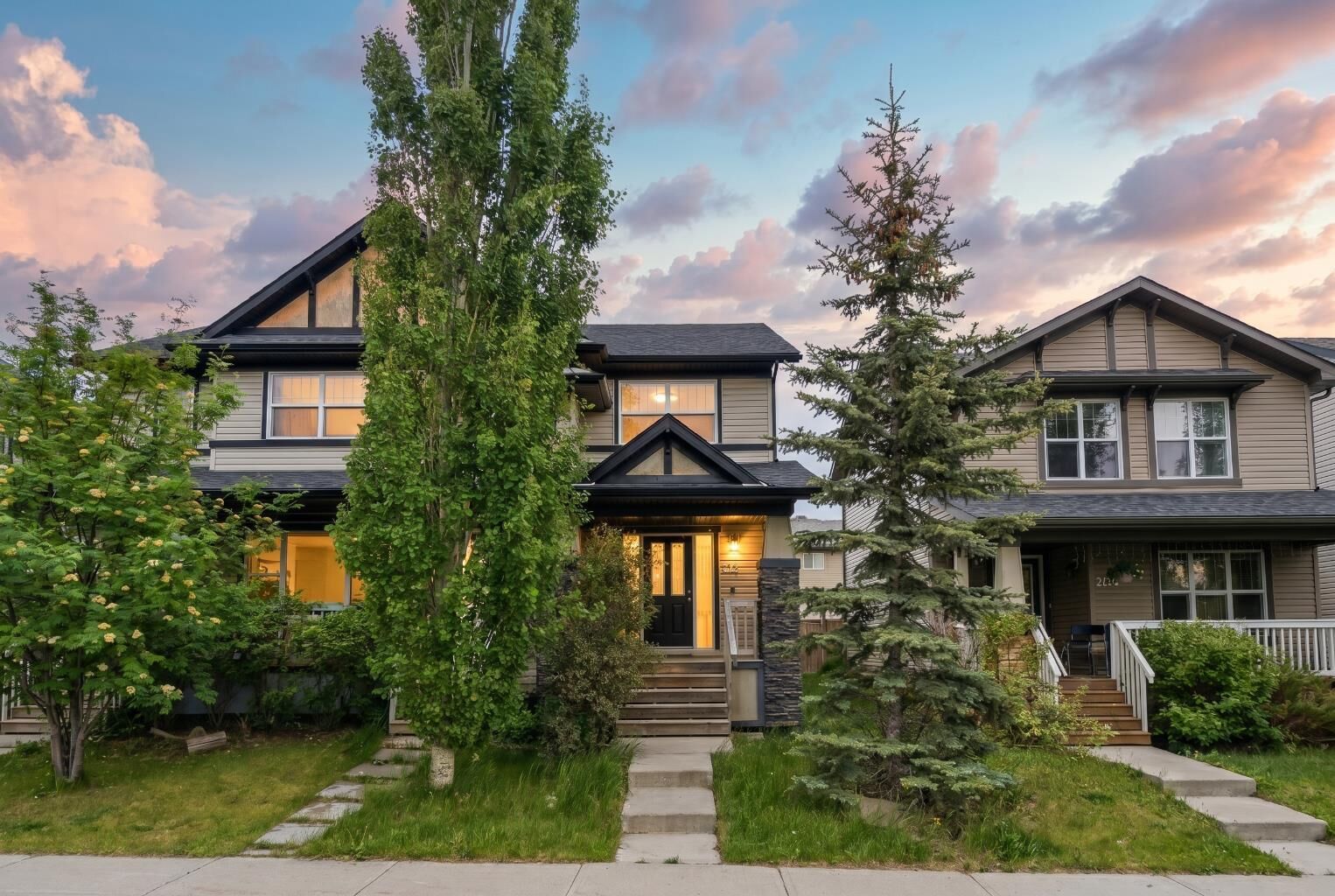 Property Photo:  212 Panatella Drive NW  AB T3K 0T4 