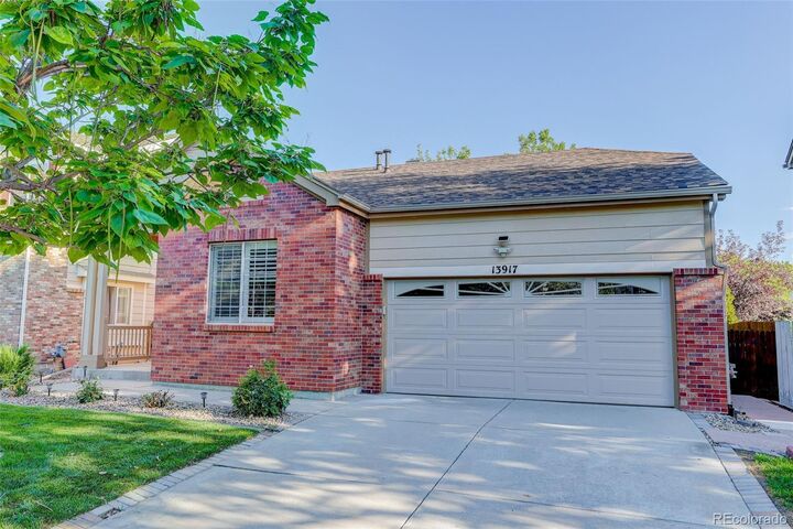 Property Photo: 13917 E 105th Place CO 80022