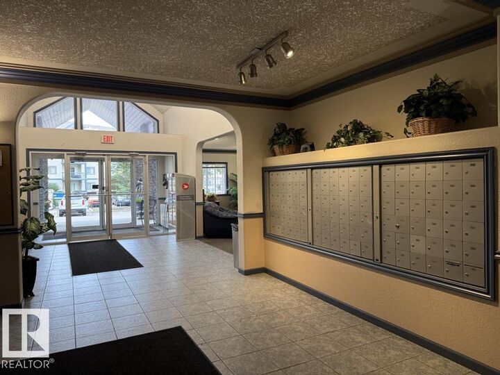 Property Photo:  16303 95 Street NW 316  AB T5Z 3V1 