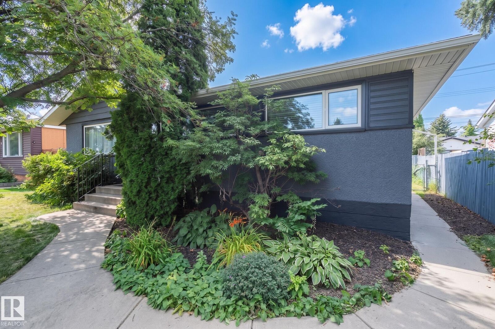 Property Photo:  5207 103 Avenue NW  AB T6A 0T1 