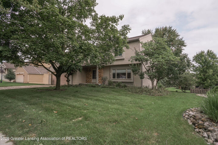 Property Photo: 5618 Bearcreek Drive MI 48917
