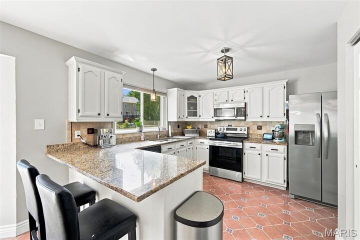 Property Photo:  1042 Remington Oaks Court  MO 63026 