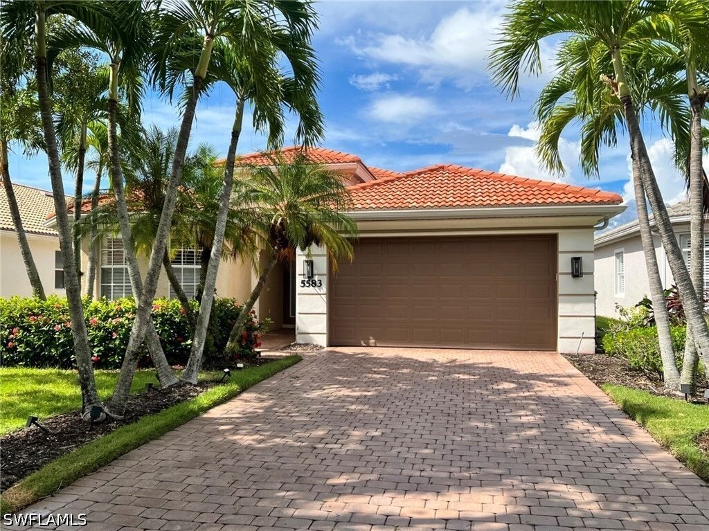 Property Photo:  5583 Lago Villaggio Way  FL 34104 