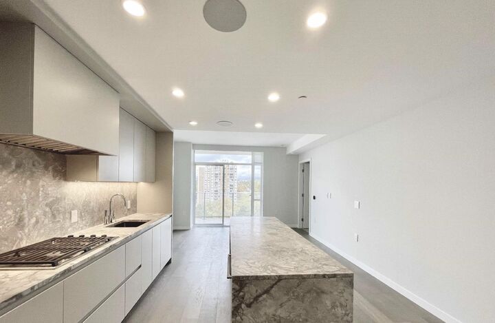 Property Photo:  7433 Cambie Street 1402  BC V6P 0J8 