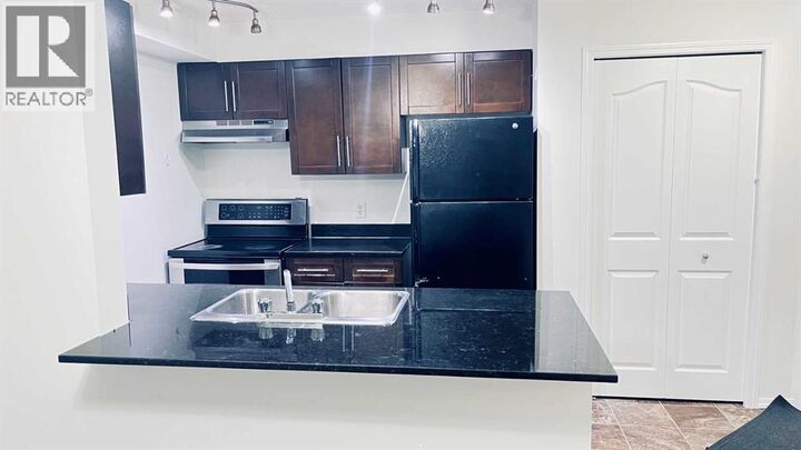 Property Photo:  7180 80 Avenue Northeast  AB T3J 0N6 