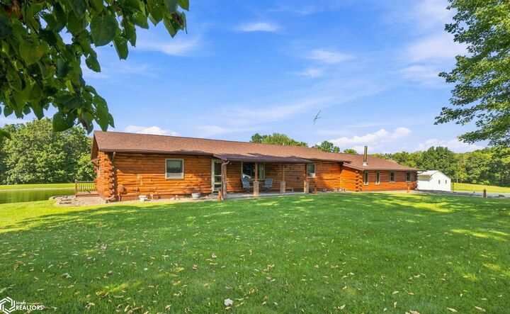 Property Photo:  8001 Hawkeye Road  IA 52637 