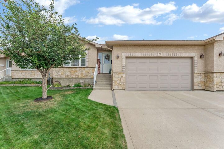 Property Photo: 72 Sandstone Place SE AB T1B 4R9