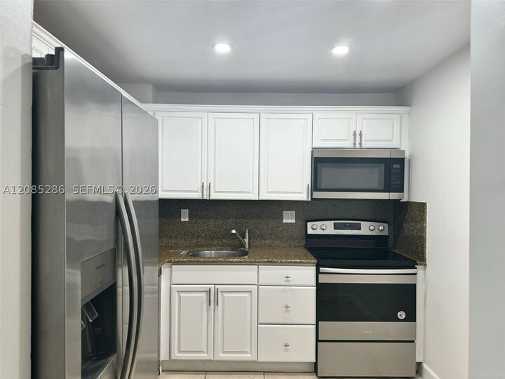 Property Photo:  13120 SW 92nd Ave B-121  FL 33176 