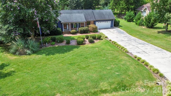 Property Photo:  127 Fairway Drive  NC 28117 