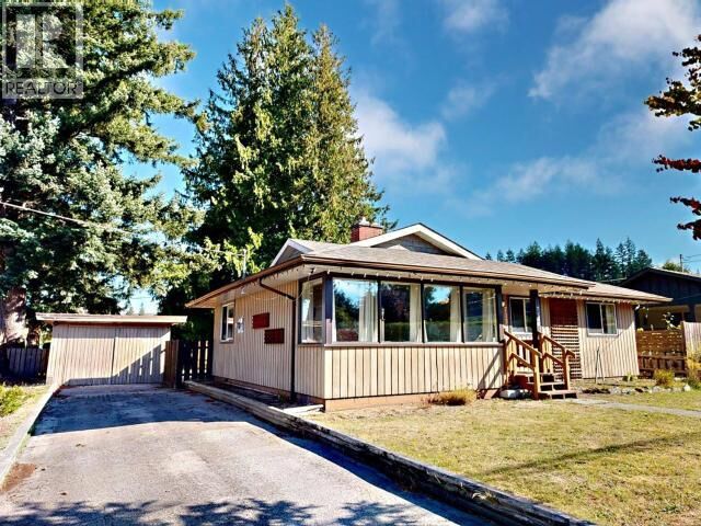 Property Photo:  7139 Barnet Street  BC V8A 1Z9 