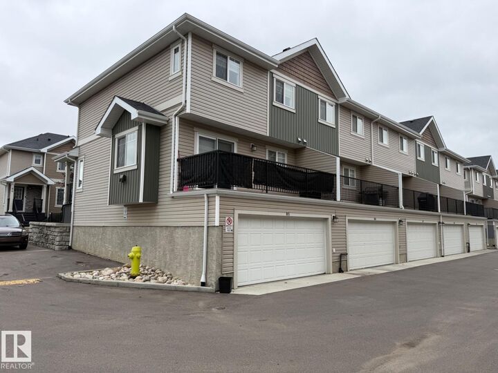 Property Photo:  9535 217 Street NW 85  AB T5T 4P5 