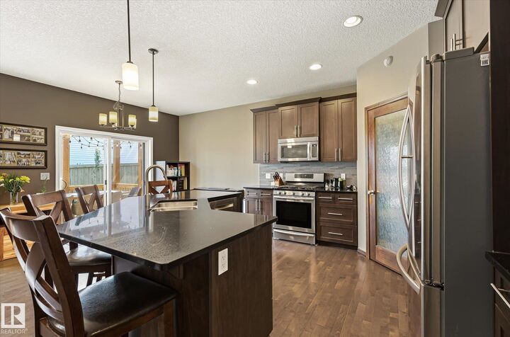 Property Photo:  913 Goshawk Point(E) NW  AB T5S 0H6 