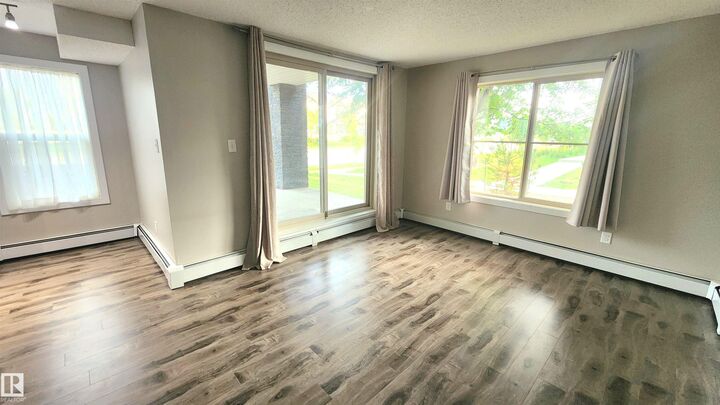 Property Photo:  11803 22 Avenue SW 101  AB T6W 2R9 