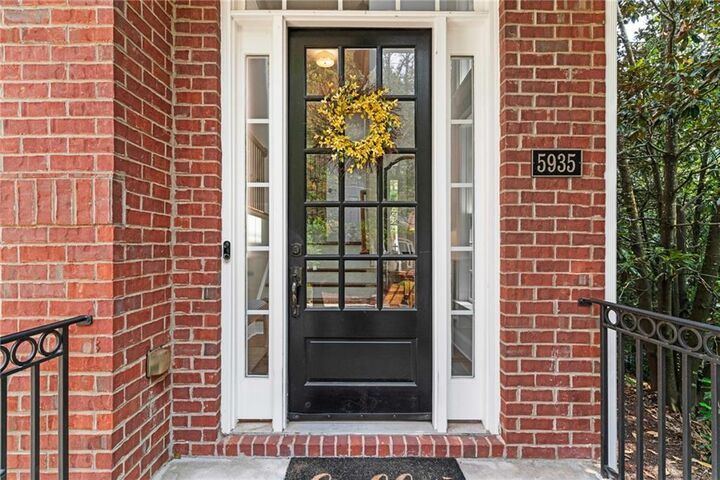 Property Photo: 5935 Reddington Way GA 30328