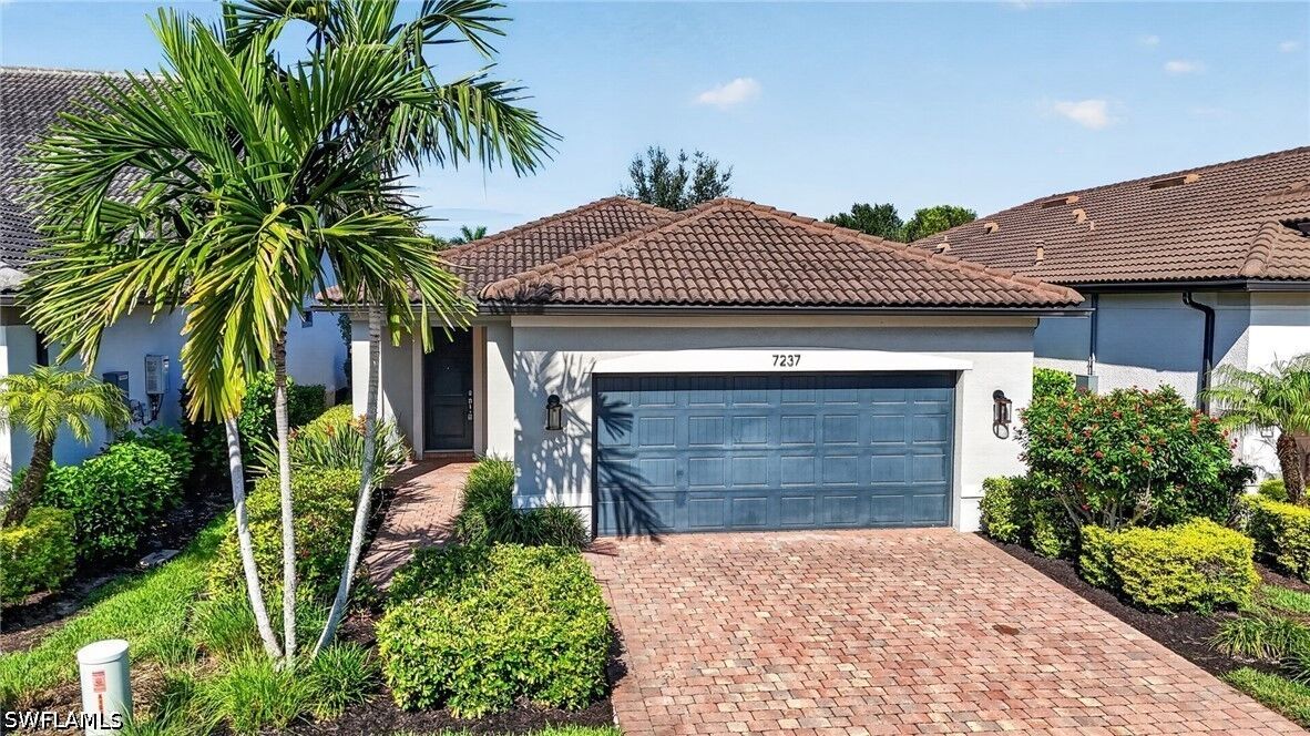 Property Photo: 7237 Wilton Drive FL 34109