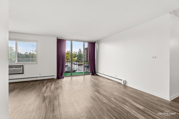 Property Photo: 4721 St. Joseph Creek Street 2-H IL 60532