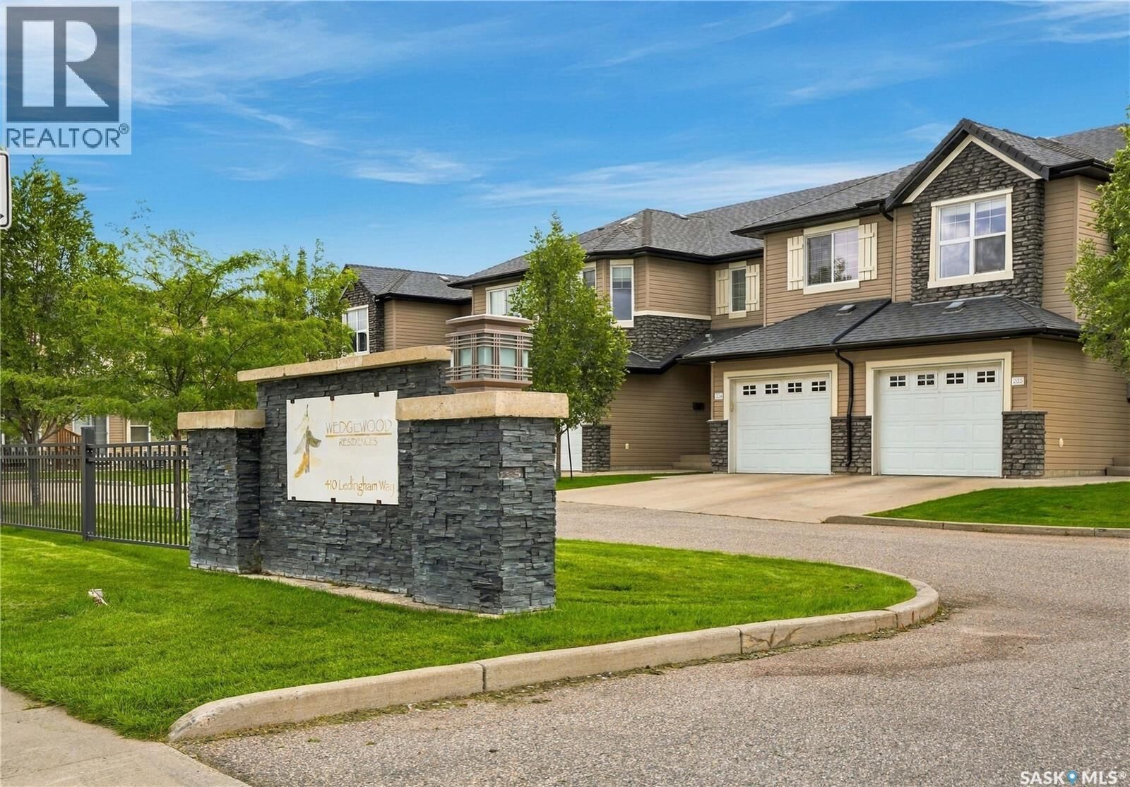 Property Photo:  203 410 Ledingham Way  SK S7V 0C4 