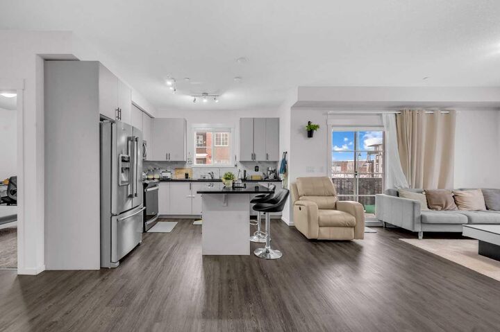 Property Photo:  151 Legacy Main Street SE 8218  AB T2X 5C7 