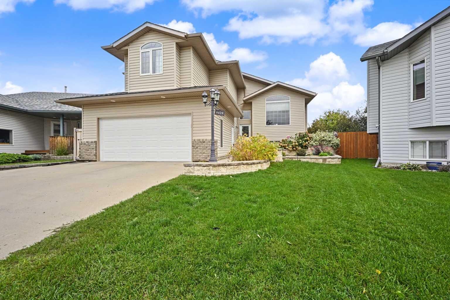 Property Photo:  6629 97 Street  AB T8W 2W2 