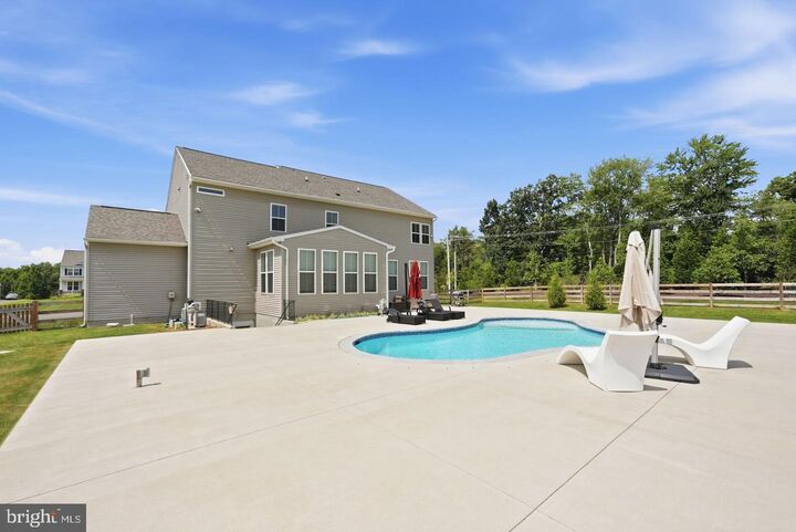 Property Photo:  7301 Sugar Magnolia Loop  VA 20155 
