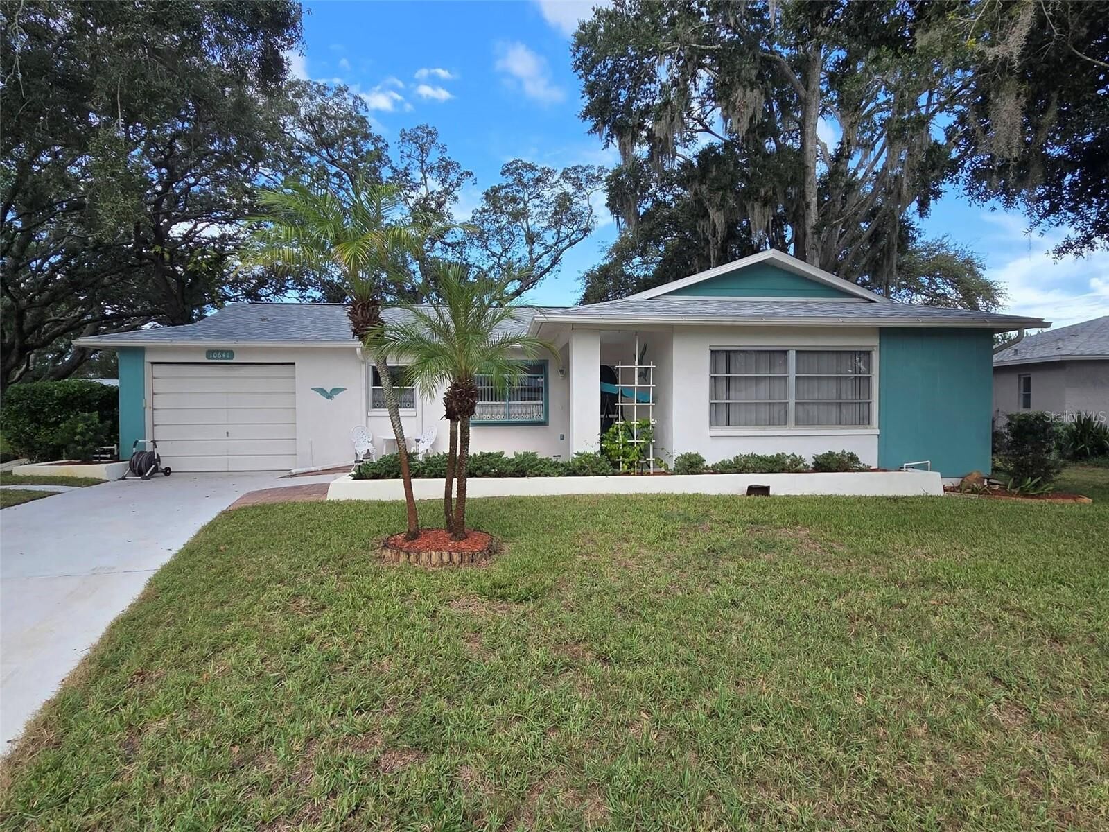 Property Photo: 10641 Tonapa Loop FL 34668