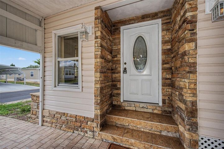 Property Photo:  39820 US Highway 19 N 106  FL 34689 