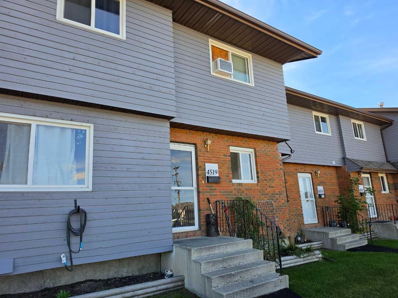 Property Photo: 4519 48 Street AB T4G 1W8