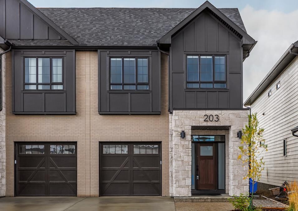 Property Photo:  203 Greenwich Drive NW  AB T3B 6N9 