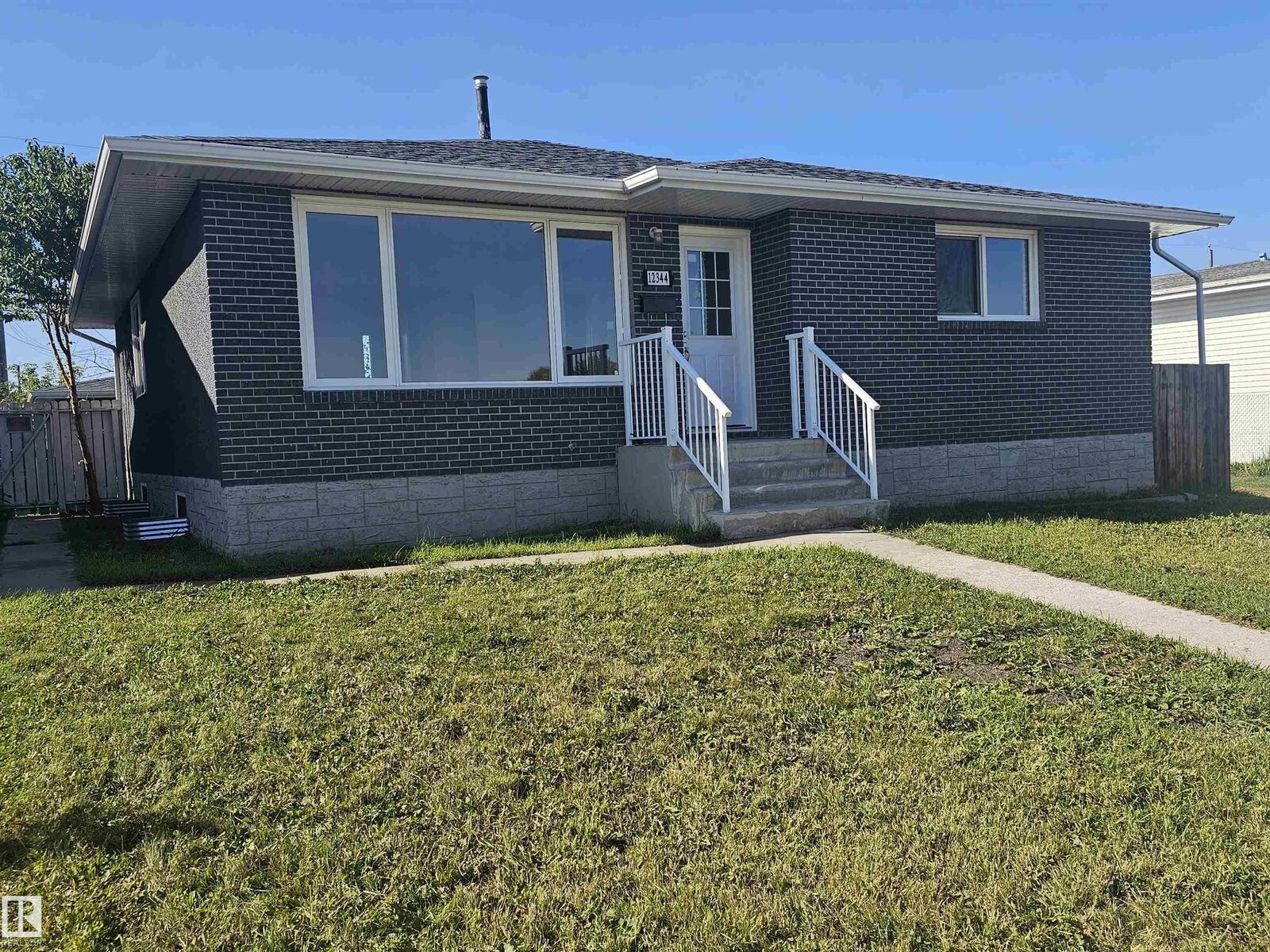 Property Photo:  12344 50 Street NW  AB T5W 3E1 