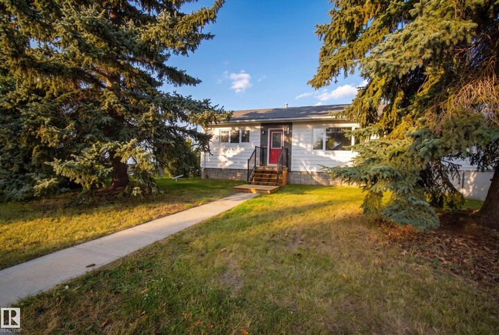 Property Photo:  8512 74 Avenue NW  AB T6C 0E9 
