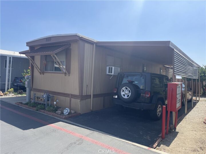Property Photo:  17455 Marygold Avenue 68  CA 92316 