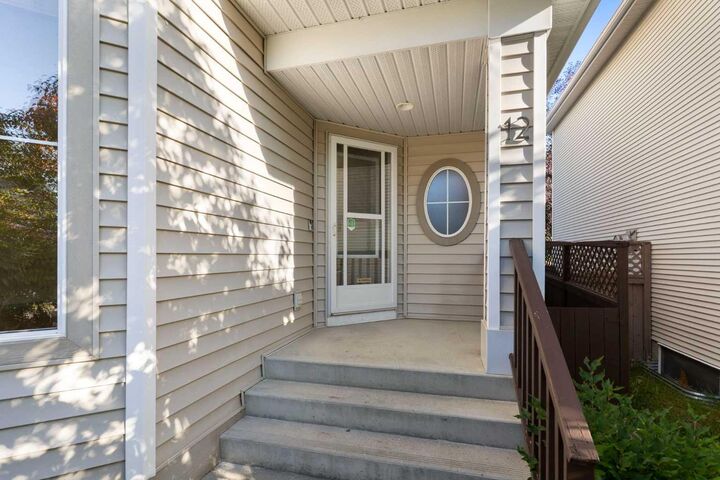 Property Photo:  12 Tuscany Springs Circle NW  AB T3L 2K8 