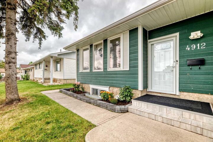 Property Photo:  4912 Rundlehorn Drive NE  AB T1Y 1B9 