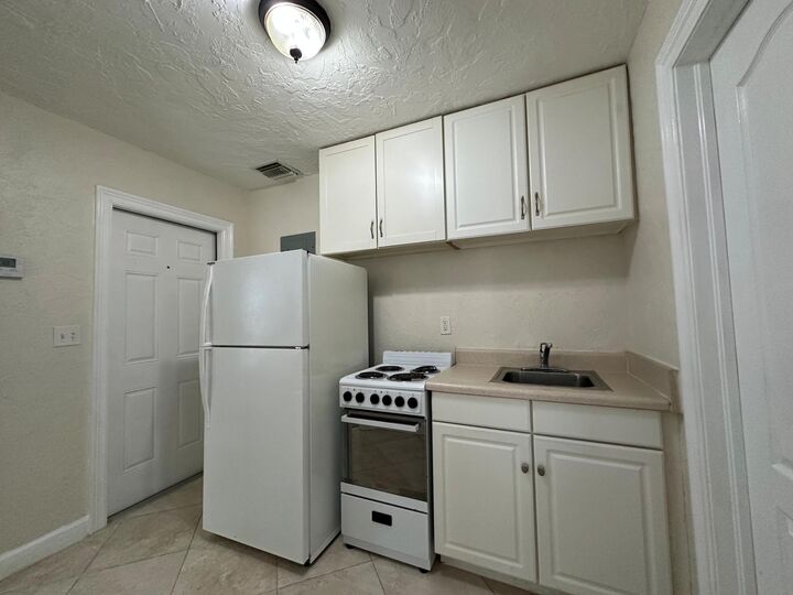Property Photo:  227 Foresteria Drive D  FL 33403 