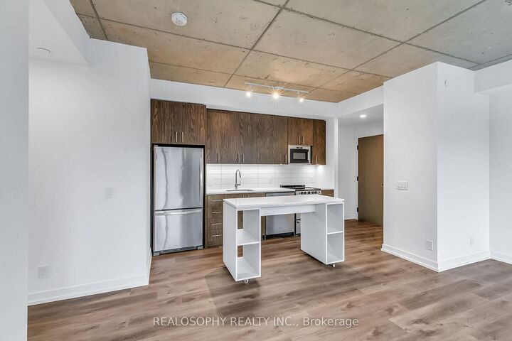 Property Photo:  115 Larchmount Avenue 303  ON M4M 2Y6 