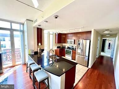 Property Photo:  155 Potomac Psge 704  MD 20745 