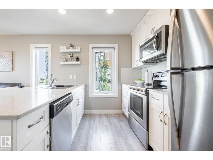 Property Photo:  #2 1203 163 St SW  AB T6W 3X1 