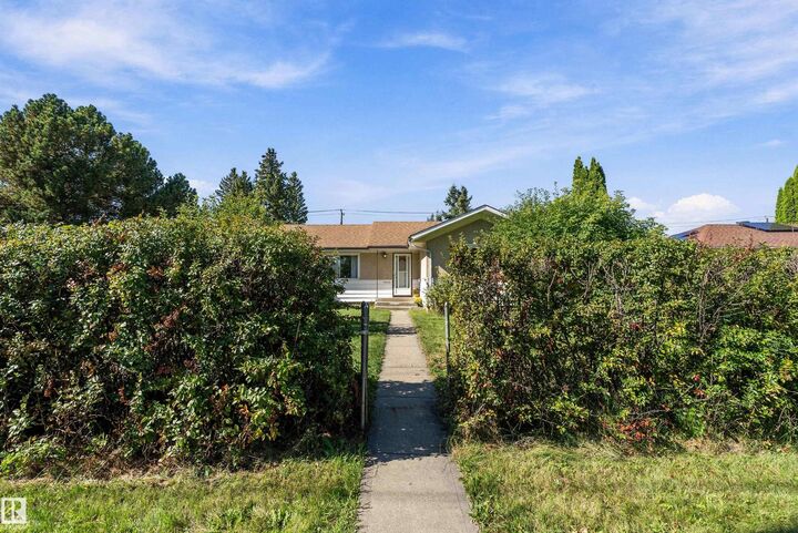Property Photo:  10432 50 Street NW  AB T6A 2C6 
