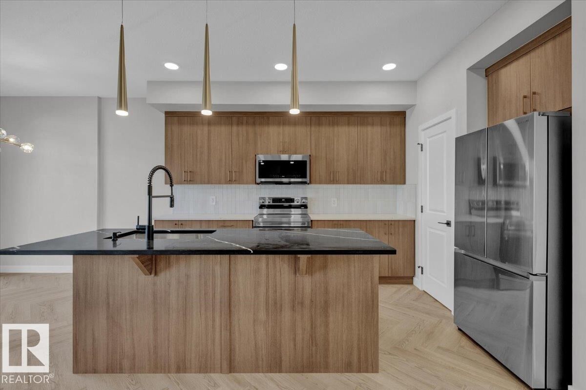 Property Photo:  8312 Kiriak Loop SW  AB T6W 5S2 