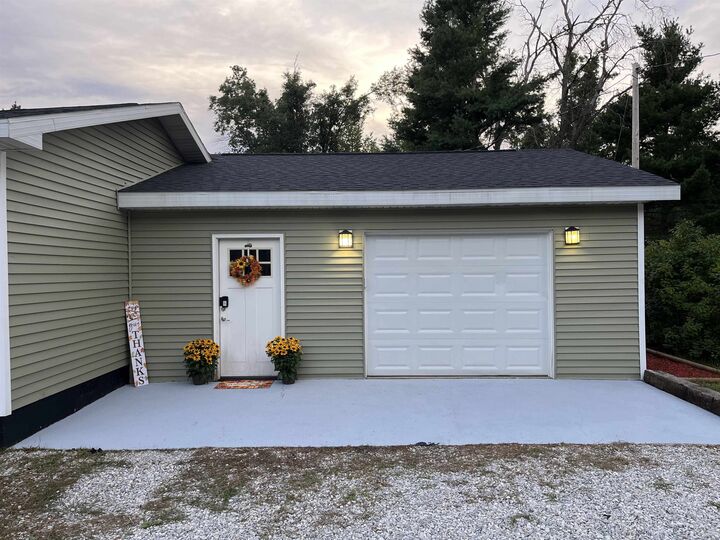 Property Photo:  11706 Crapo Lake Road  MI 49738 