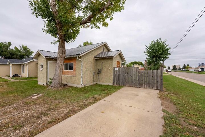 Property Photo:  5603 56 Street  AB T1G 1L4 