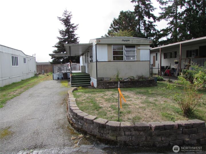 Property Photo: 5220 176th Street SW 28 WA 98037