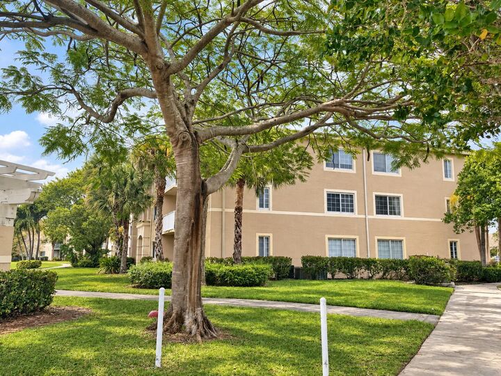Property Photo:  5021 Wiles Road Apt 301  FL 33073 