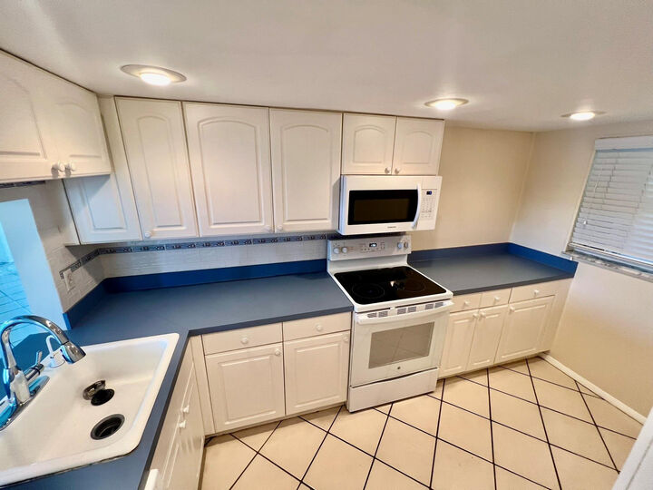 Property Photo:  9450 Poinciana Place 416  FL 33324 